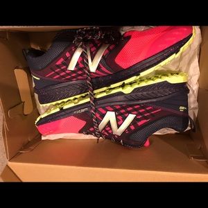 New in box, women’s size 11 New Balance Trail-runner tennis shoes